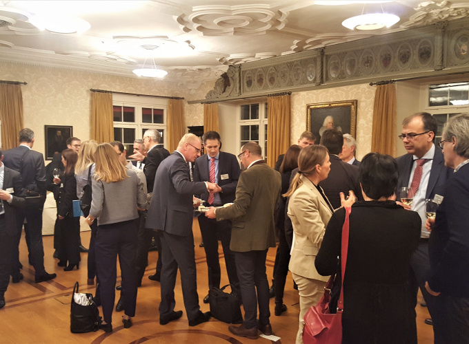 Participants enjoying refreshments while networking